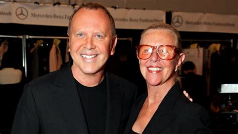 who owns michael kors.